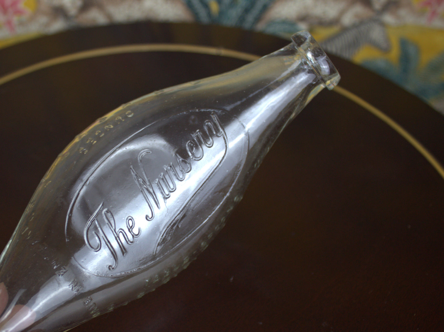 Vintage “The Nursery” Glass Feeding Bottle – A Rare and Charming Collectible