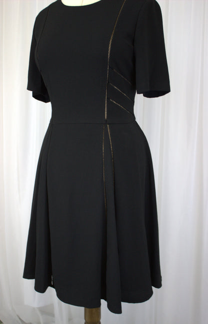 Elegant Fit-and-Flare Little Black Dress with Subtle Mesh Details – Size 14, Vintage-Inspired Chic