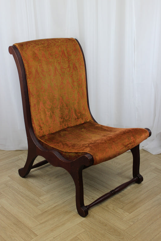 Antique Upholstered Slipper Chair with Ornate Design