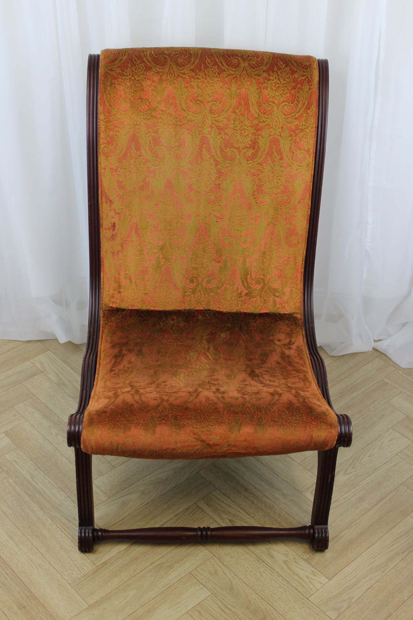 Antique Upholstered Slipper Chair with Ornate Design