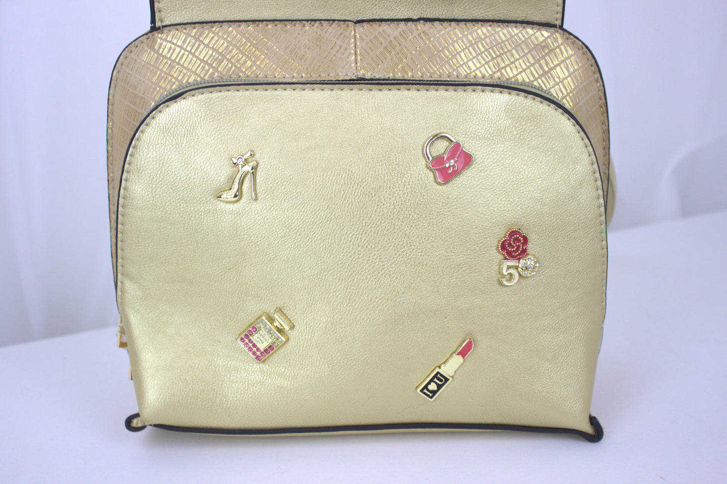 Retro Gold Mini Handbag with Iconic Charm Accents