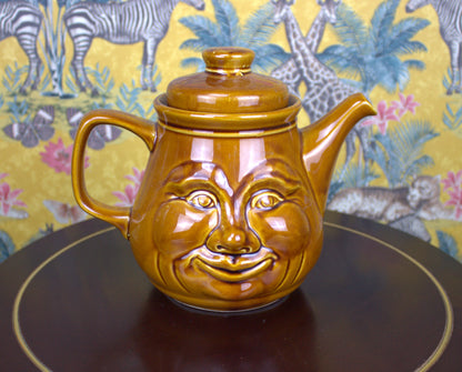 Vintage Sunshine Face Teapot – A Cheery and Unique Treasure