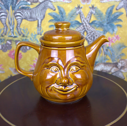 Vintage Sunshine Face Teapot – A Cheery and Unique Treasure